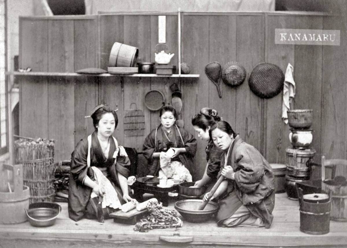 Women preparing a meal, 1870s