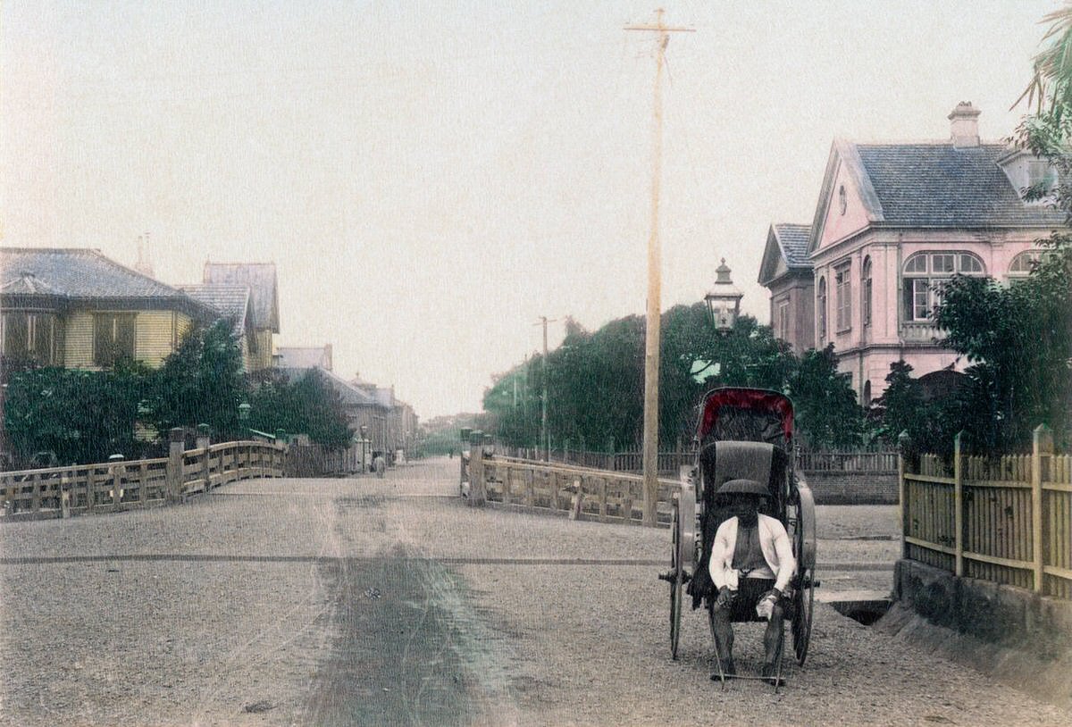 Rickshaw on a street in the Tsukiji foreign settlement of Tokyo, 1890s