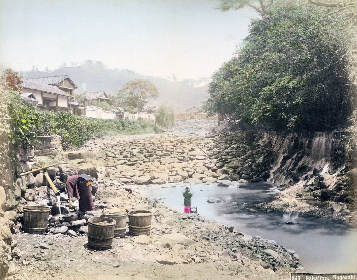 Women getting water at the Zeniyagawa River in Nagasaki, 1890s