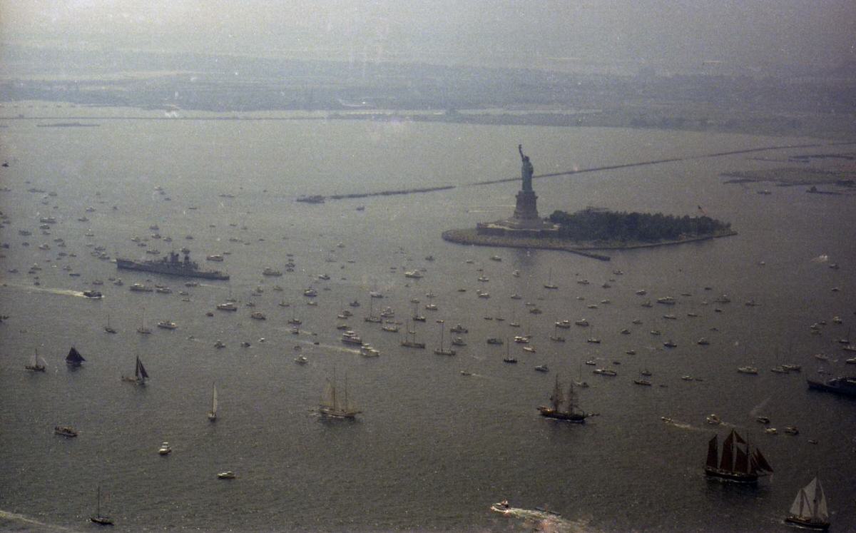 Abandoned Caven Point Pier and the industrial shoreline of Jersey City during the Bicentennial, 1976