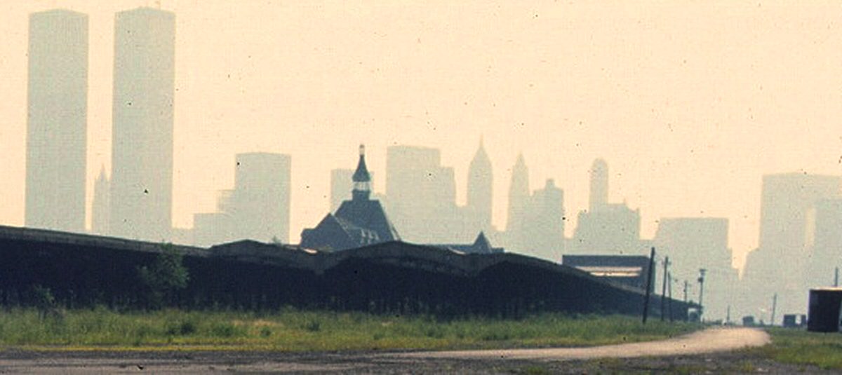 Lower Manhattan skyline seen from the abandoned Central Railroad of New Jersey terminal, 1976