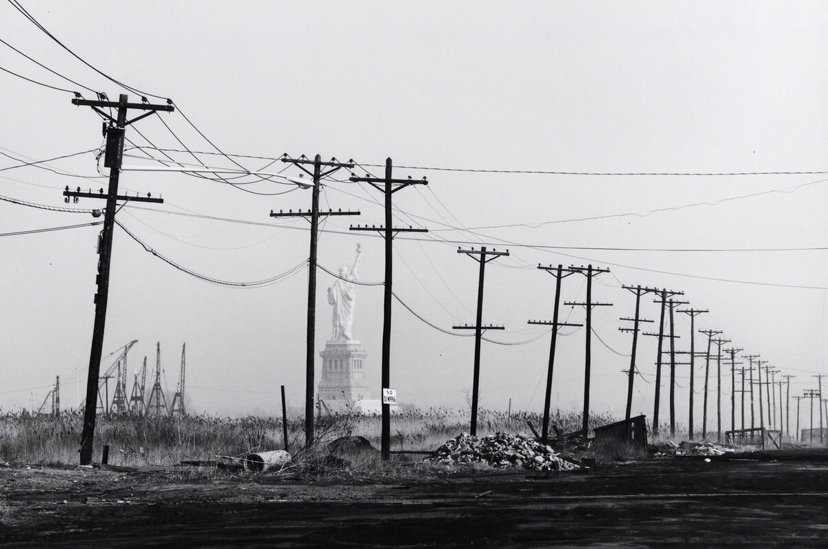 Wasteland and leaning telephone poles at Caven Point Road in the Black Tom area of Jersey City, 1976