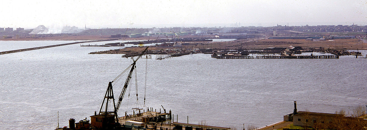 Industrial and railroad ruins on the Jersey City shoreline seen from the Statue of Liberty, 1973