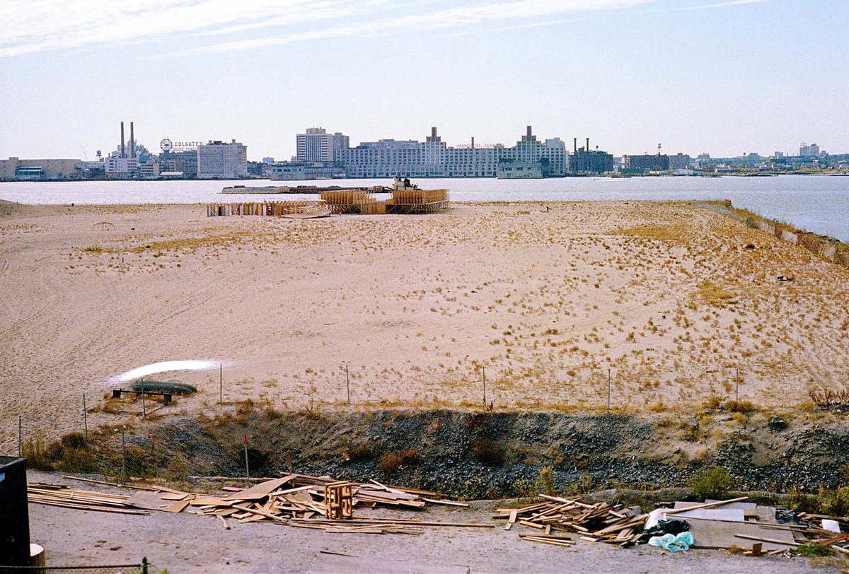 Battery Park City landfill and the Jersey City waterfront seen from the West Side Highway, 1977