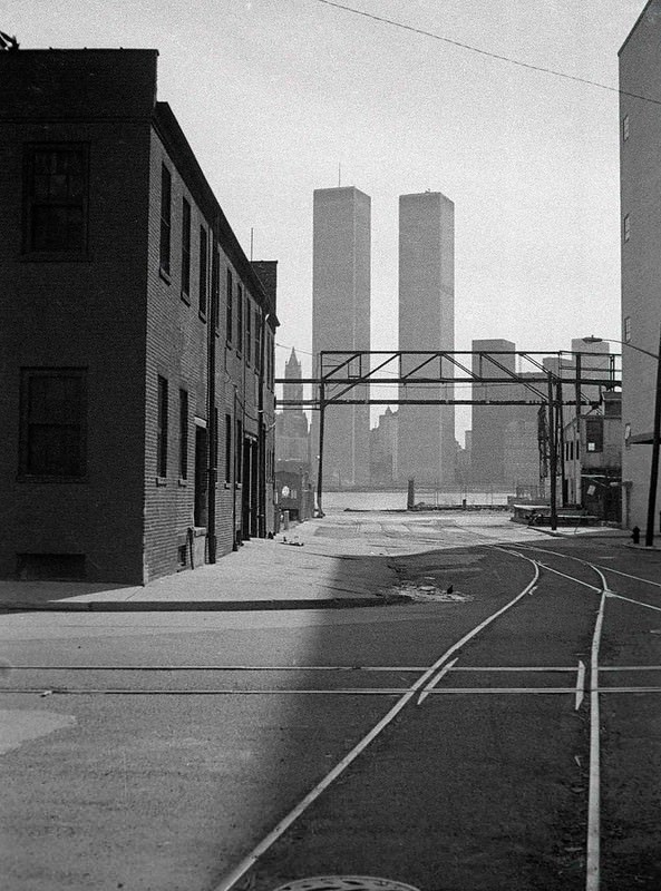 Colgate plant warehouse and the World Trade Center in Jersey City, 1975