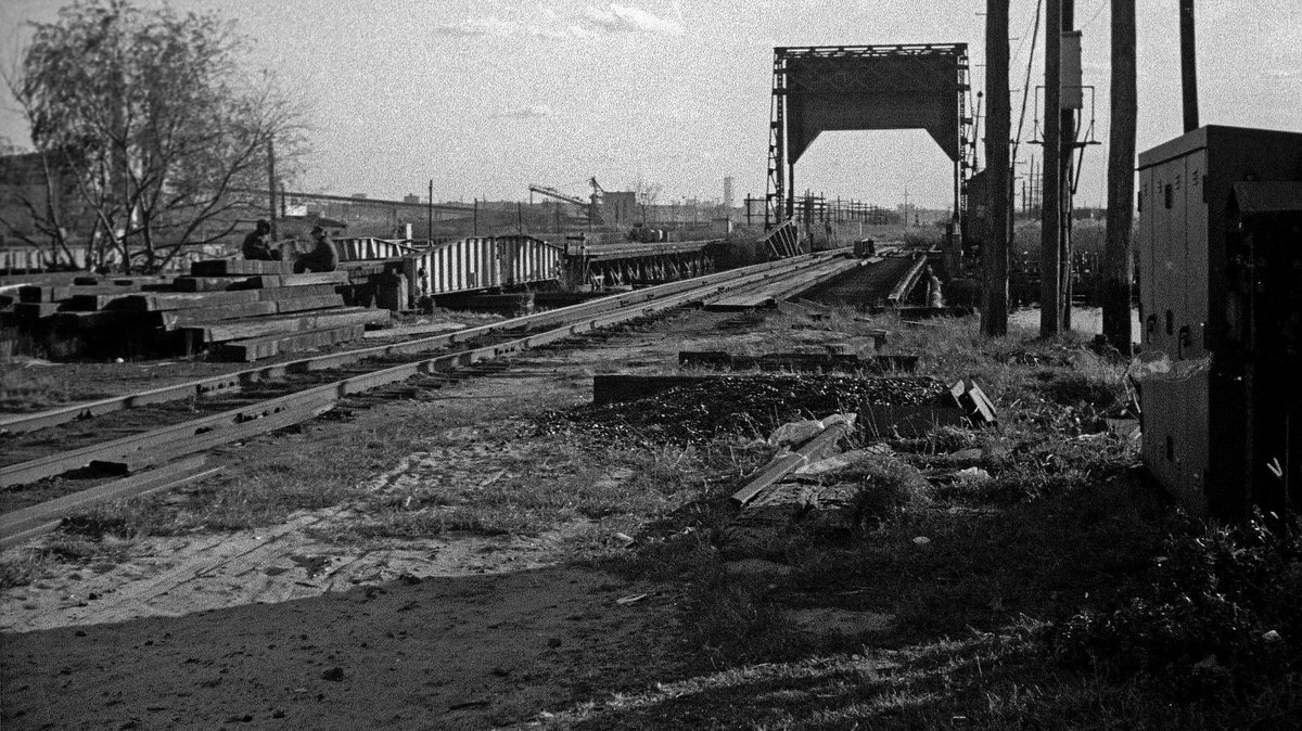 Railroad bridges and the Meadowlands swamps looking toward the World Trade Center, 1973