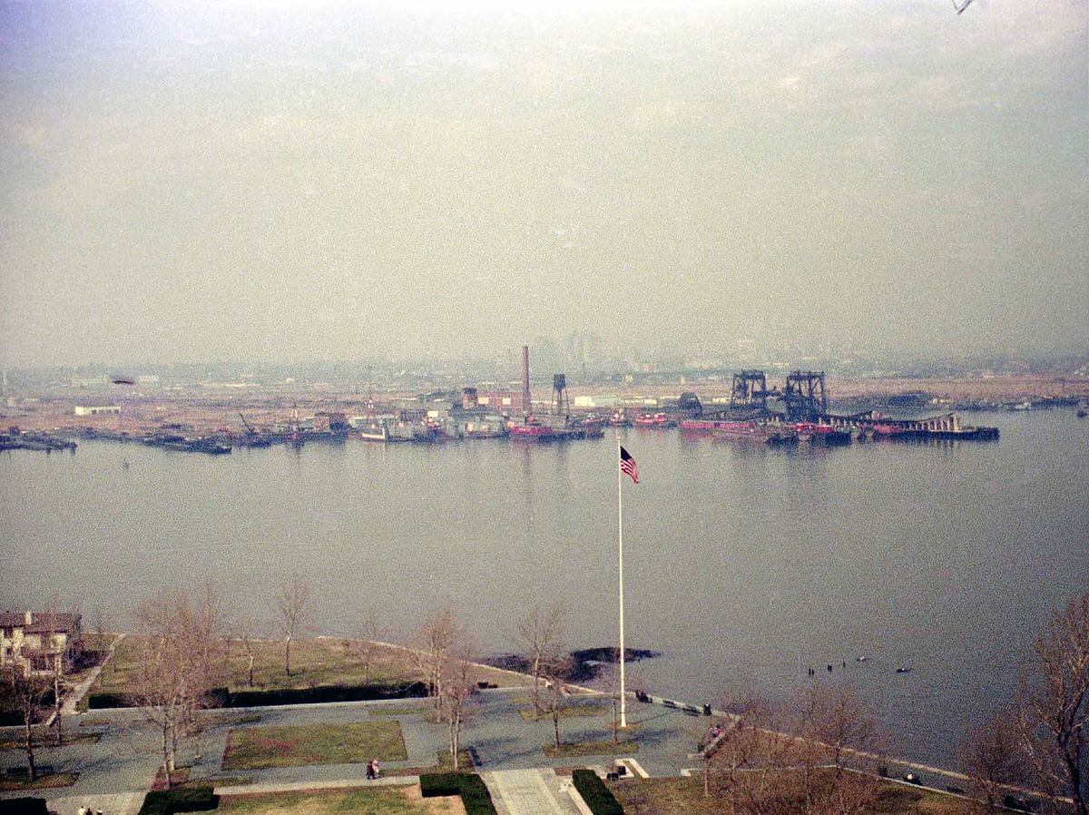 Abandoned industrial waterfront in Jersey City seen from the Statue of Liberty, 1973
