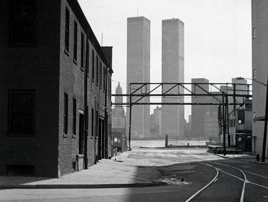 World Trade Center seen from the industrial shoreline of Sussex Street in Jersey City, 1975