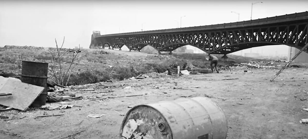 Scavenging in the industrial lands under the Pulaski Skyway in Jersey City, 1975