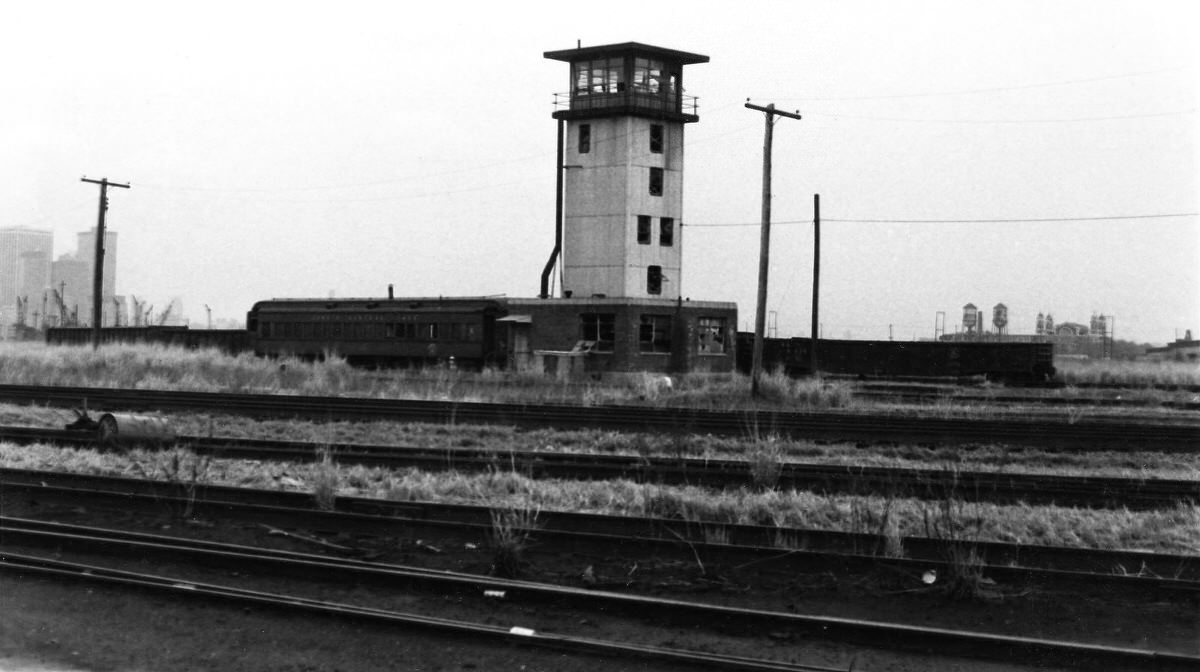 Abandoned Central Railroad of New Jersey tower and Ellis Island in Jersey City, 1976