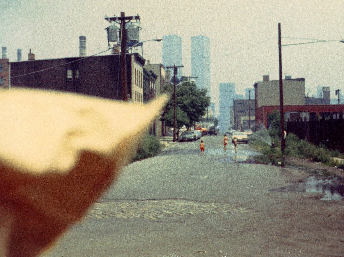 Children playing in a fire hydrant on Dudley Street in Jersey City, 1975