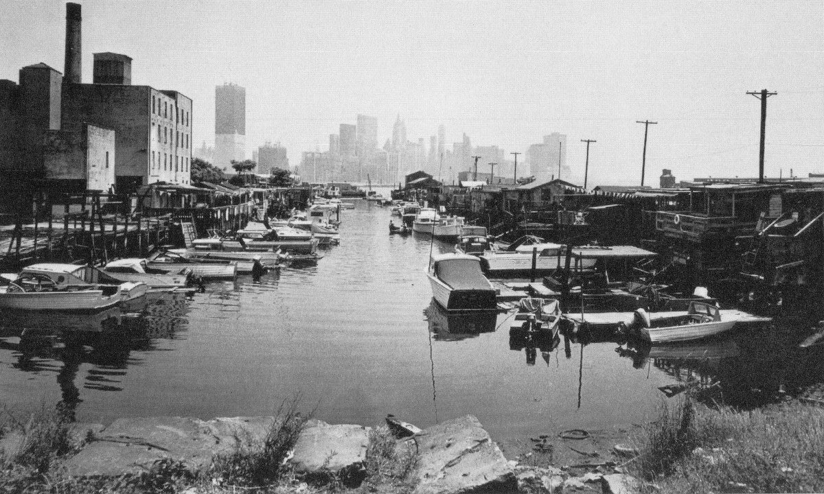 Greene Street Boat Club at the Morris Canal Small Basin with the World Trade Center under construction, 1970
