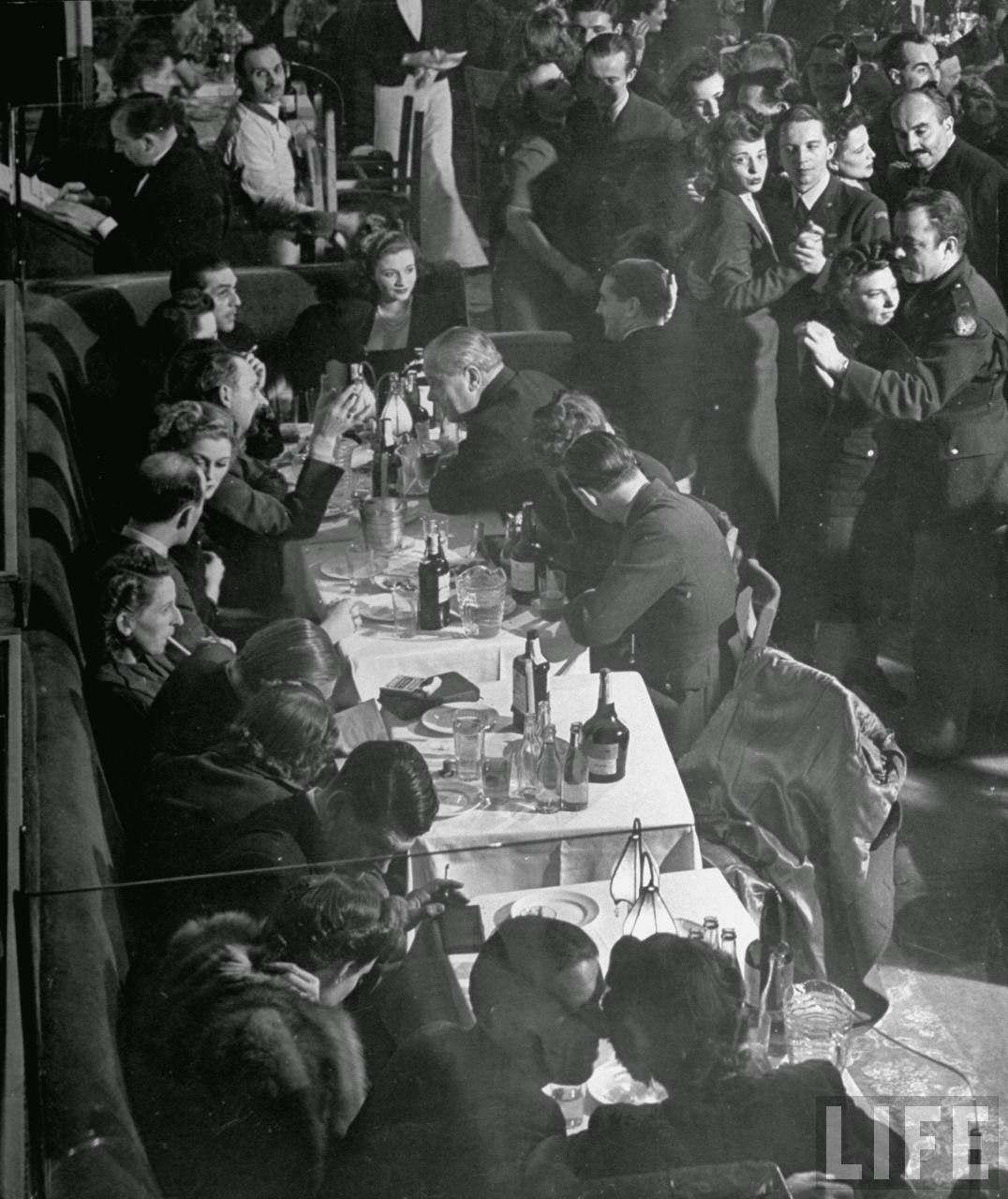 Soldiers drinking in a bar, 1940s