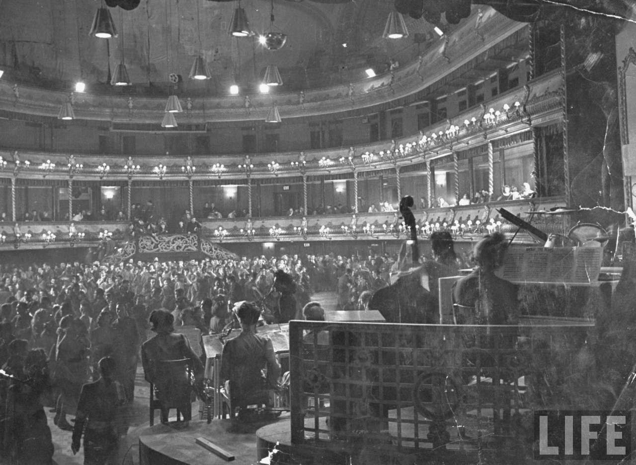 People dancing at the Covent Garden Opera House after its conversion to a nightclub during World War II, 1940s