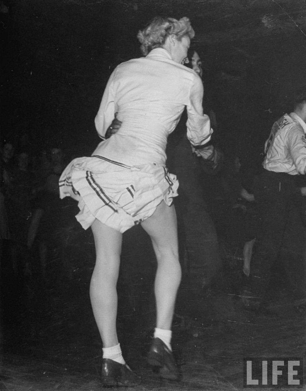 Girl dancing the jitterbug at the Paramount Dance Hall on Tottenham Court Road, 1940s