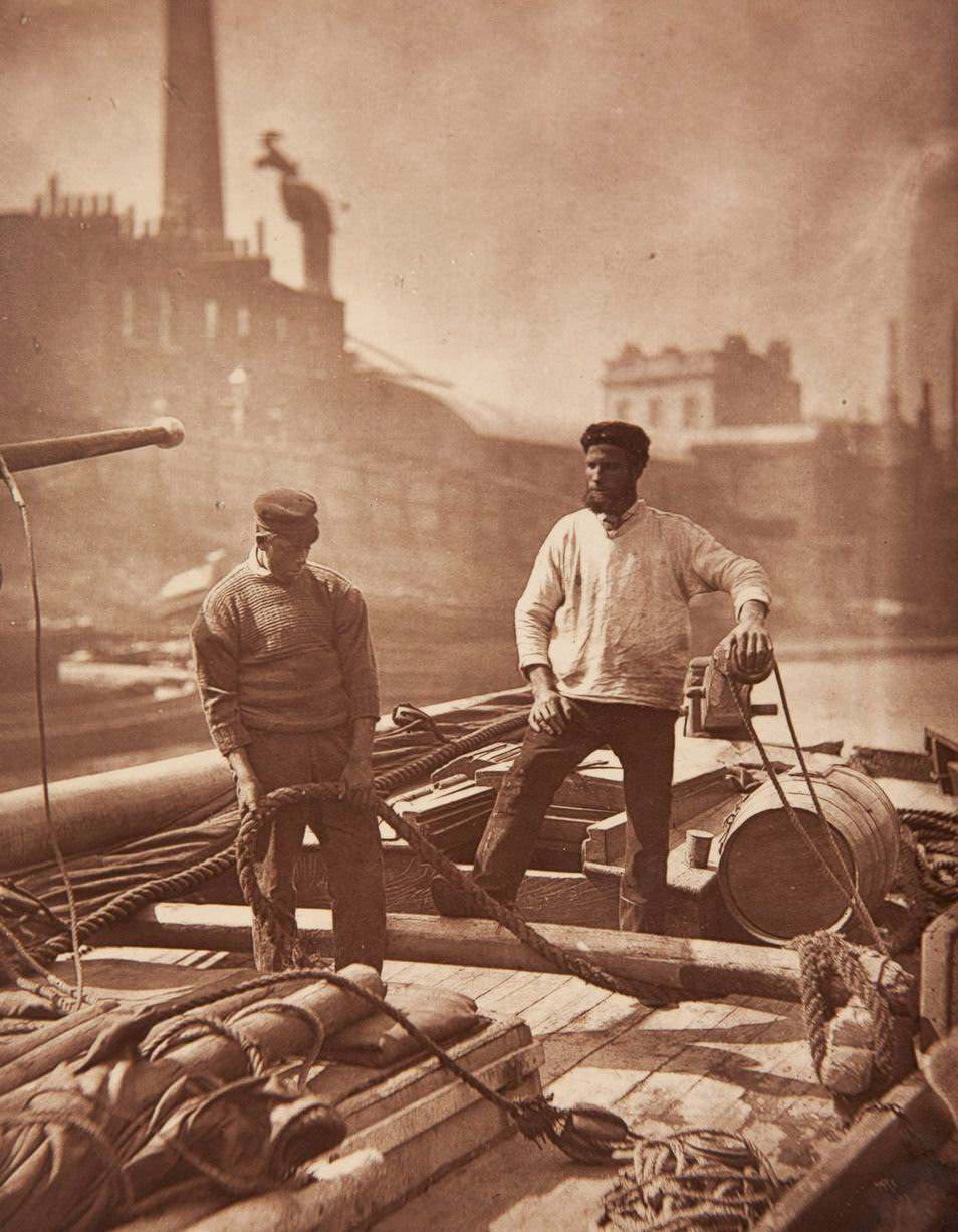 Workers on the "silent highway" (boatmen on Thames)