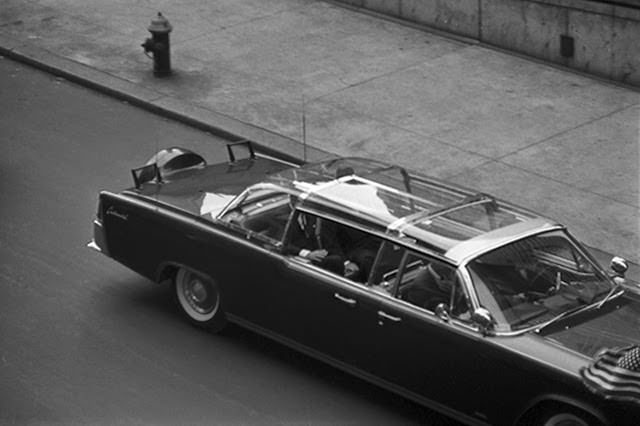 John F. Kennedy arriving in a limousine at Madison Square Garden for a Birthday Salute, 1962
