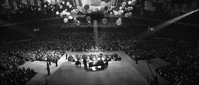 Stage and seating at Madison Square Garden during a Birthday Salute for JFK, 1962