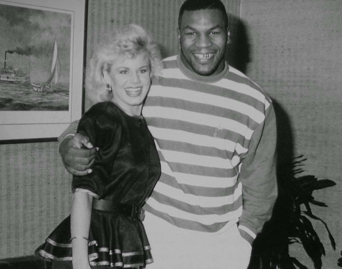 Gretchen Carlson receiving a hug from Mike Tyson, 1989