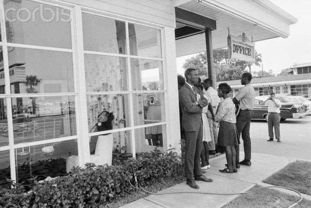 Shocking 1964 Photo Series Captured a Motel Manager Pouring “Acid” Into a Pool to Force Black People Out