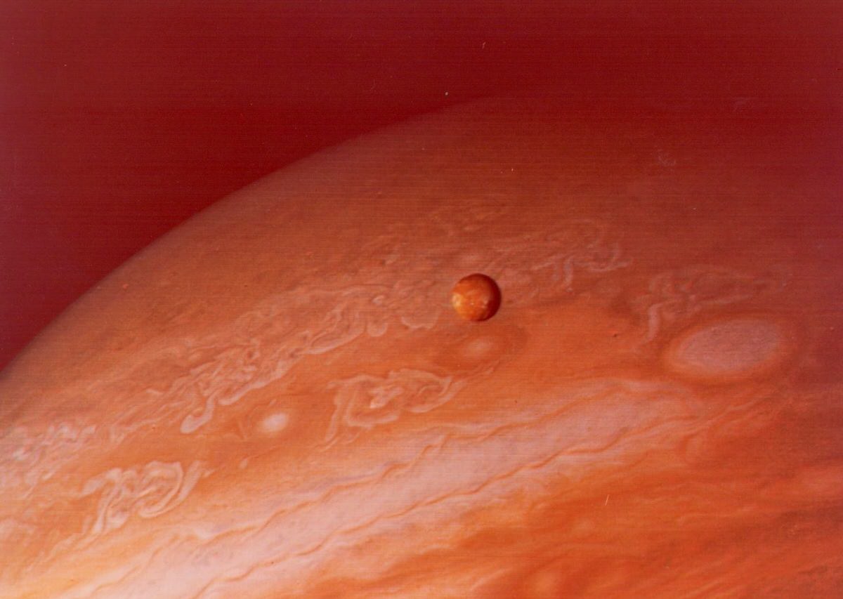 Jupiter and its satellite Io, Voyager 2, June 1979.