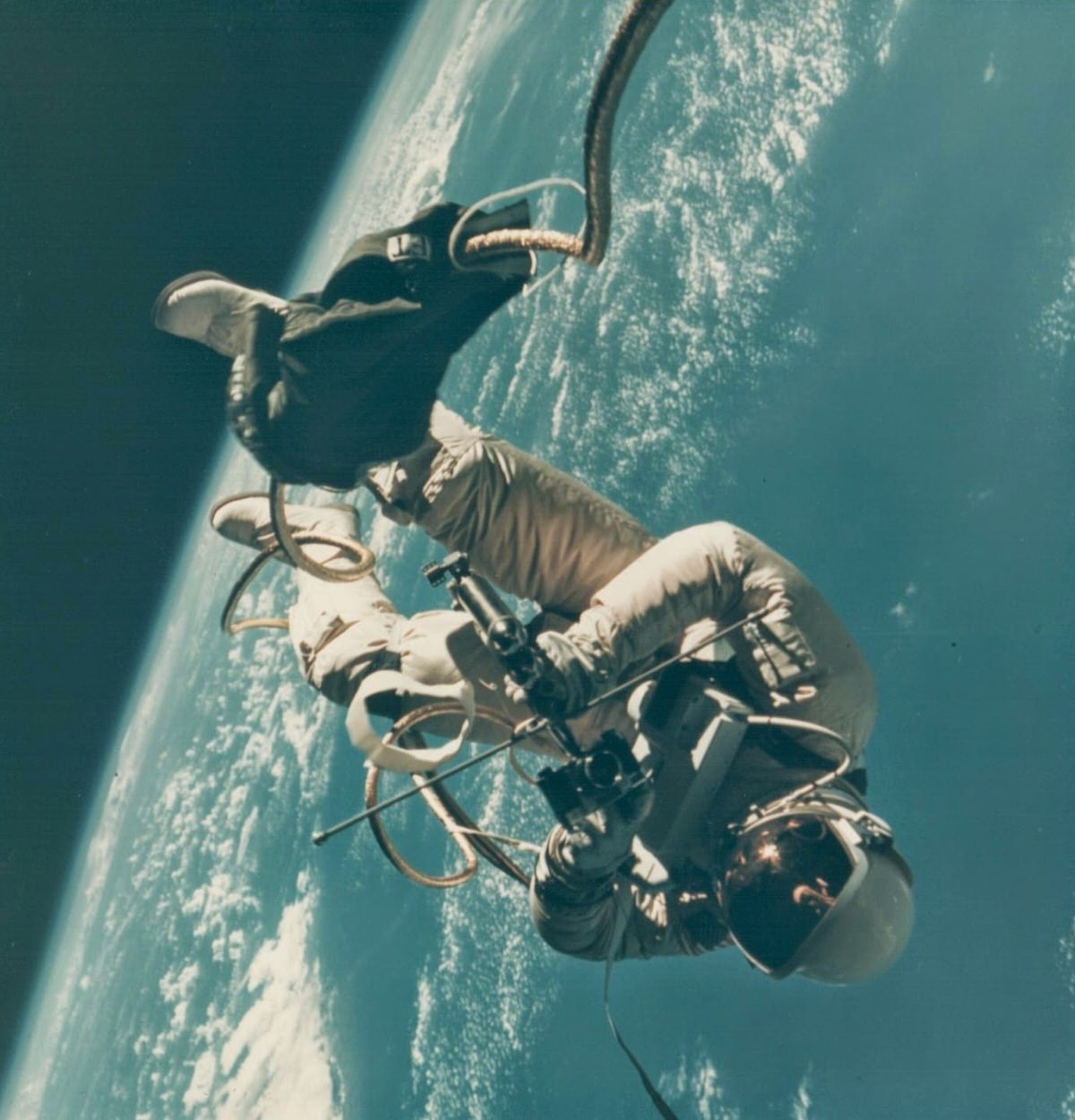 James McDivitt, Ed White walking in space, Gemini 4, June 1965.