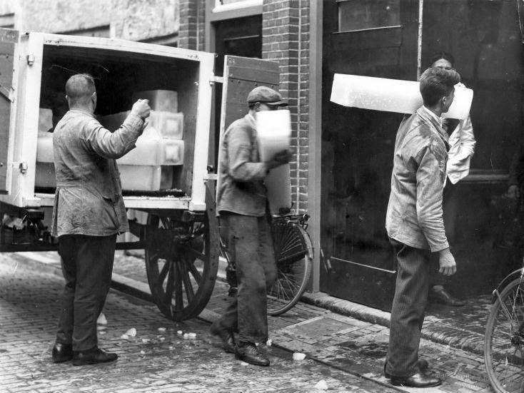 Men delivering ice in the old days when there were no refridgerators. The Netherlands, 1930's .