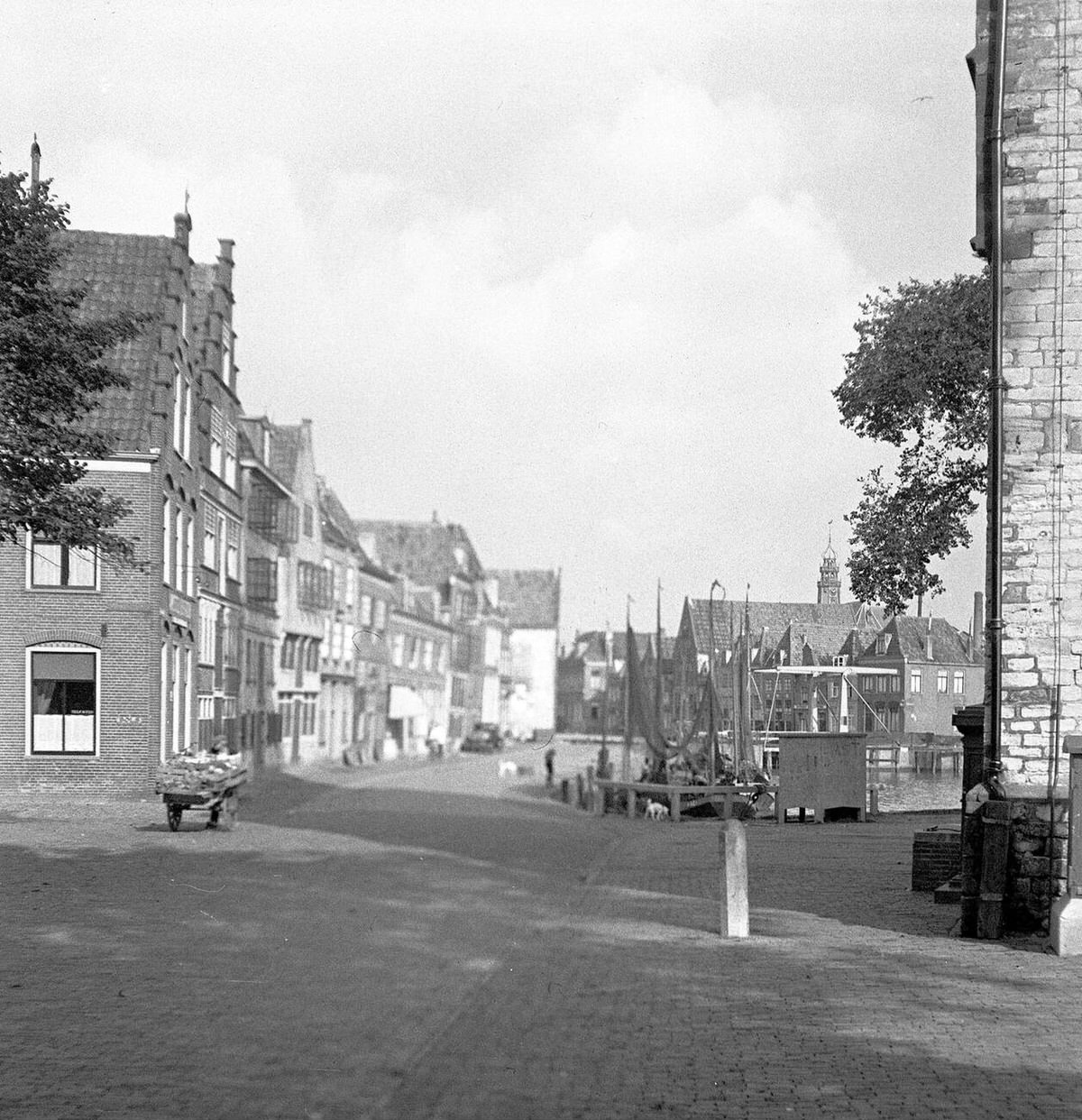 Boats and streets along a canal in Holland, 1921