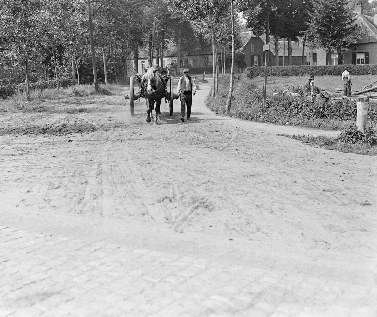 Man with a horse and carriage on a dirt road in Best, 1934