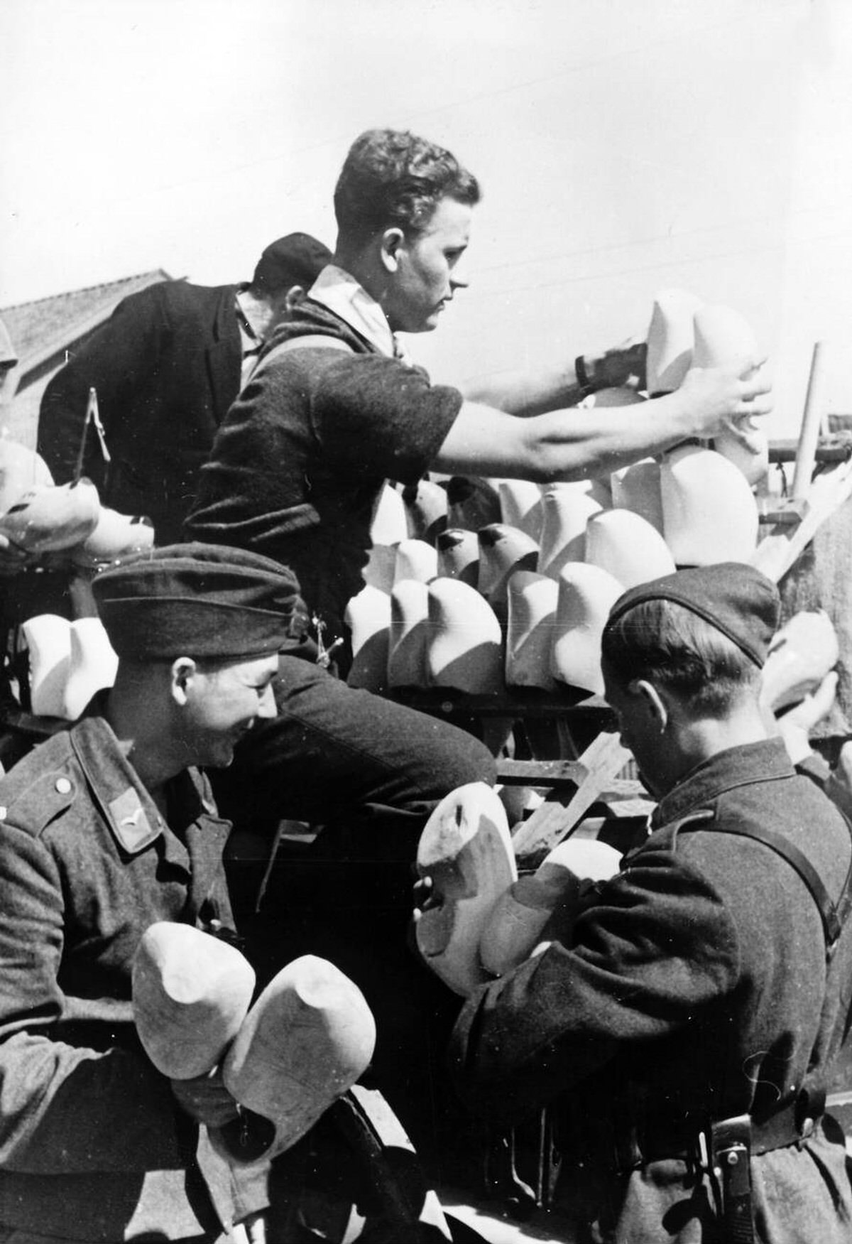 German Wehrmacht soldiers purchasing wooden clogs in the occupied Netherlands, 1940