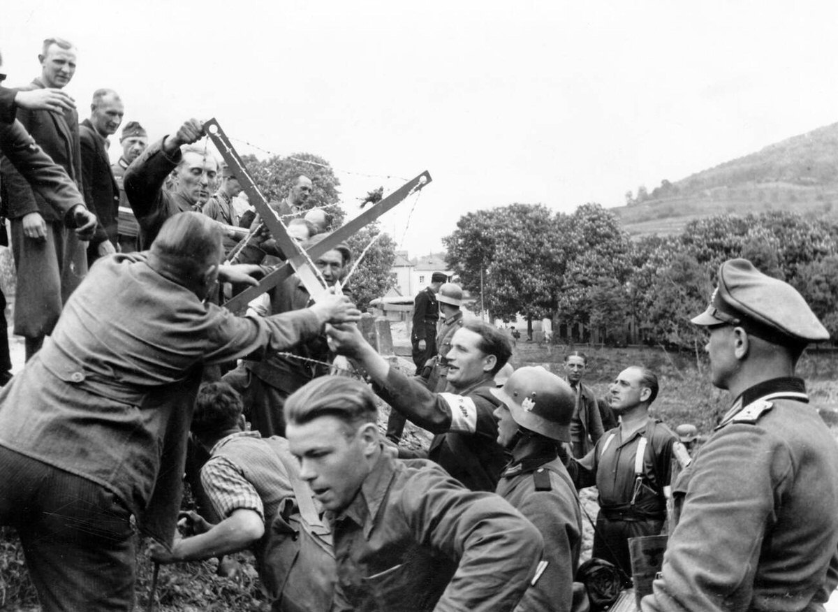 German Wehrmacht frontline workers clearing transport routes during the invasion of the Benelux countries, 1940