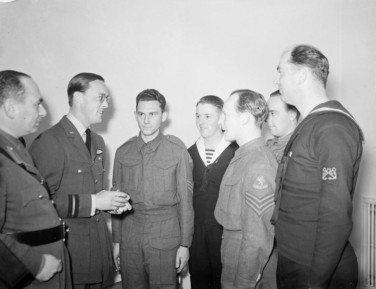 Prince Bernhard chatting with Free Dutch soldiers and sailors at a luncheon in London, 1941