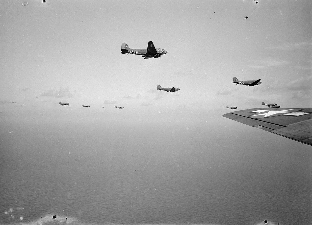 Allied transport planes and gliders crossing the English countryside on their way to Holland, 1944
