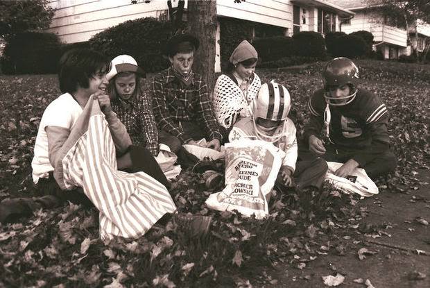Six unidentified children are shown sorting through their goodies after trick or treating in Edison in 1976. Star-Ledger archive photo.