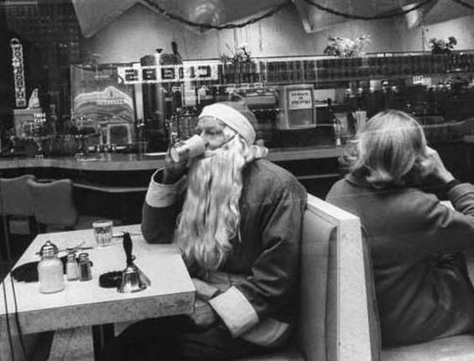 Santa Claus taking a break at Liss Drugs in Jersey City.