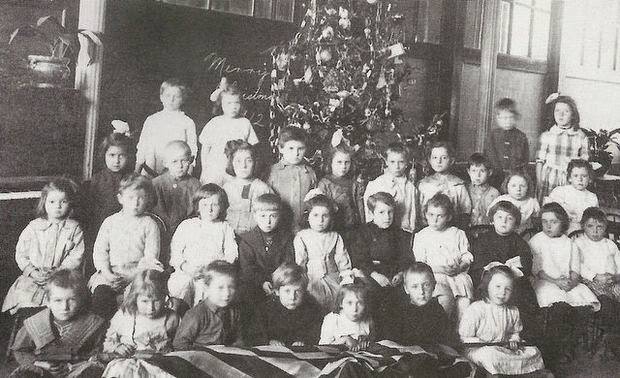 First-grade class posing in front of a holiday tree at the Lyncrest School in Fair Lawn, 1951