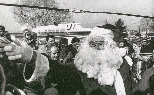 Santa Claus arriving by helicopter in Clifton, 1983