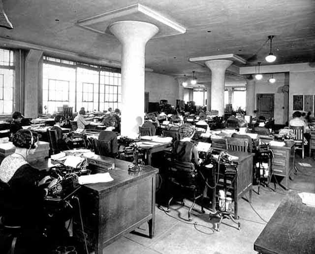 Stenographers transcribing with dictating machines and typewriters at the Bureau of Engraving in Minneapolis, 1925