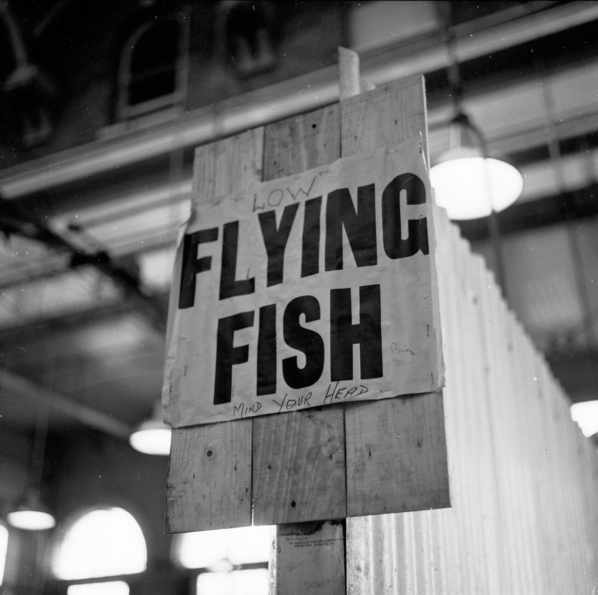 Flying Fish sign on a trader's stall at Billingsgate Fish Market, 1950s