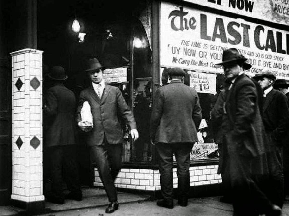 This liquor store advertises that "The time is getting shorter and so is our stock..." as Prohibition begins in 1920.