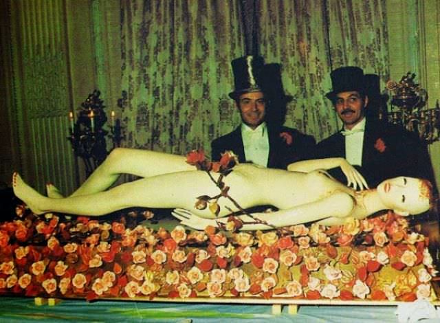A mannequin-cadaver type thing on the diner table.