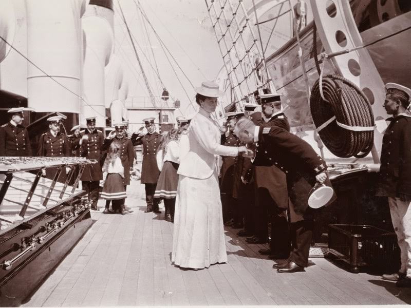 Alexandra Feodorovna welcomed by officers for a cruise on her yacht, 1908