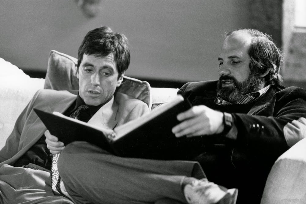 Perusing the shooting script with Pacino and De Palma.