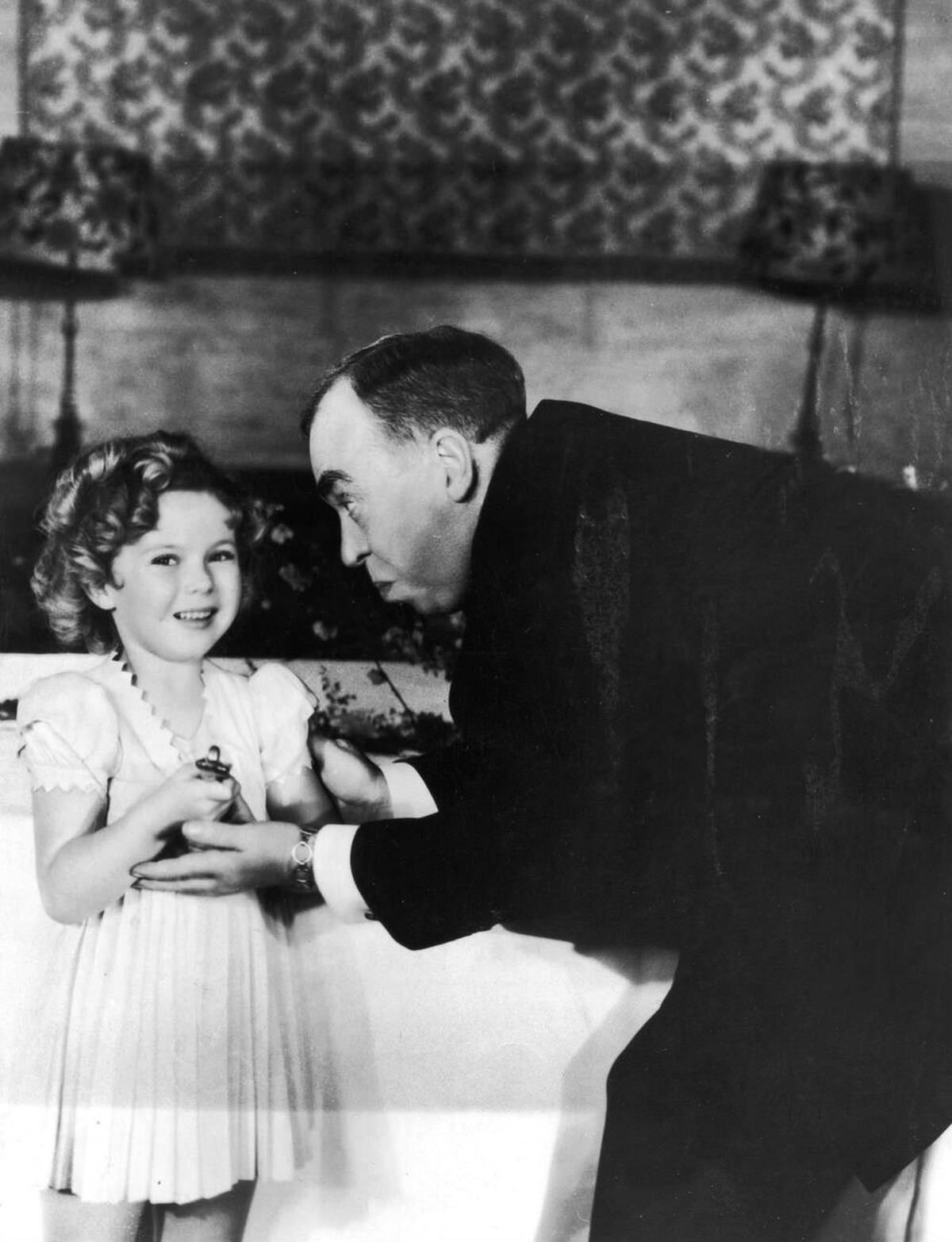 Shirley Temple receiving an Honorary Academy Award, 1934