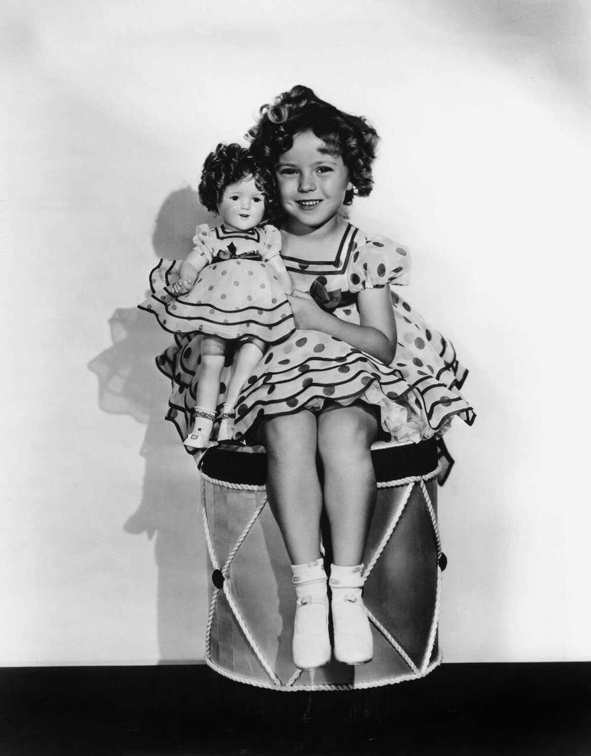 Shirley Temple with a look-alike doll, 1936