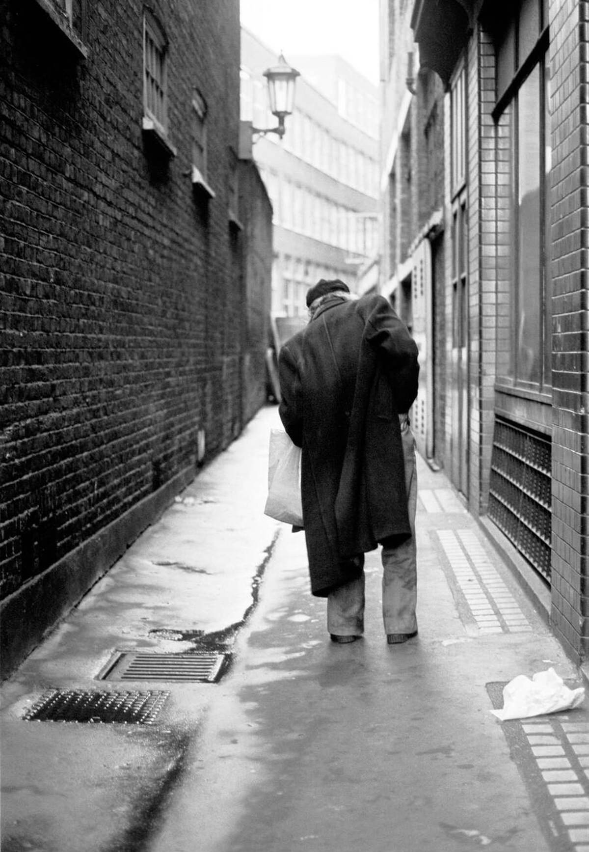 Old man in an alleyway in Soho, 1977