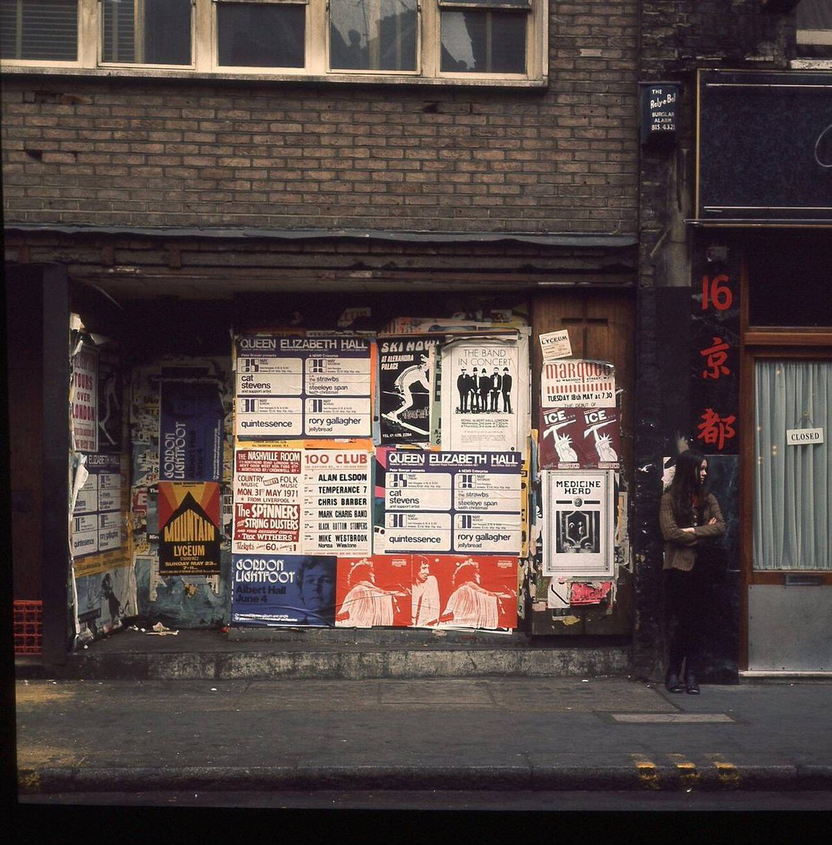 Posters on a wall in Soho, 1971