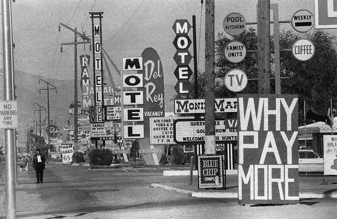 Highway with advertising signs in Reno, Nevada, 1963
