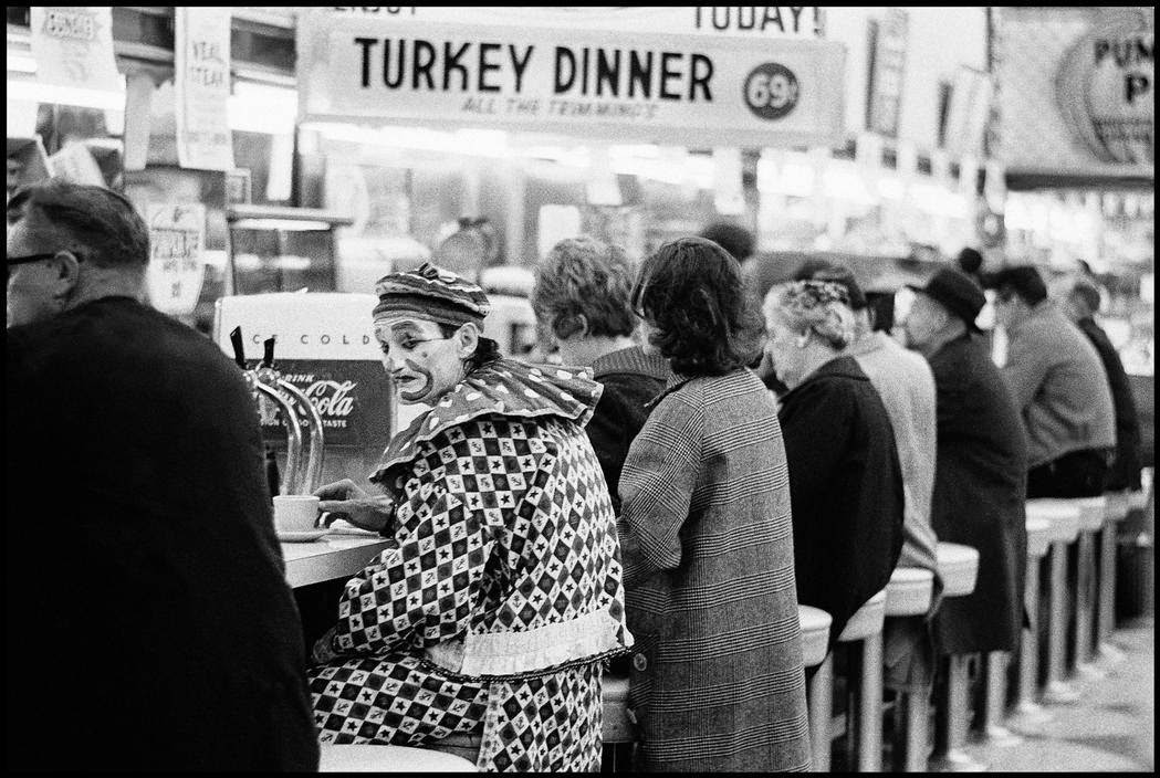 Clown at a lunch counter in a Reno diner, 1963
