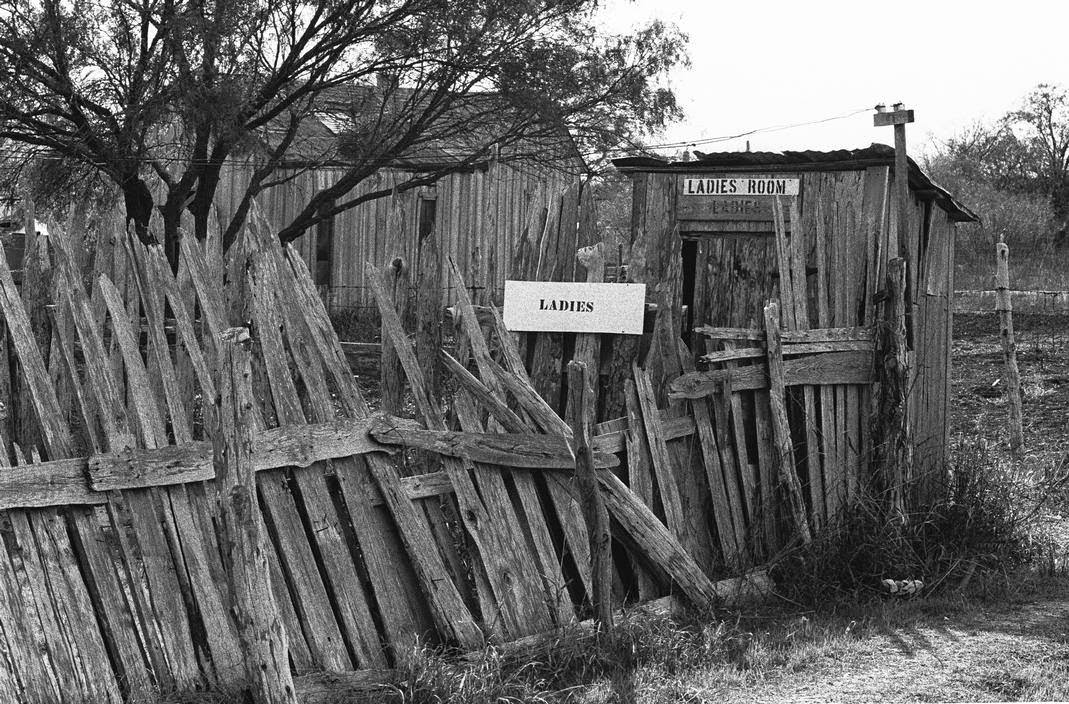 Ladies' room in an African American village near San Antonio, 1963